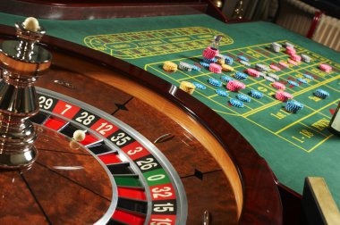 Live dealer dealing cards during Three Card Poker game on master38